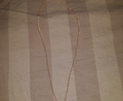 A venda Fio dourado com pingente de chave