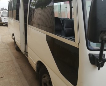 A venda Toyota Coaster de 30 Lugares