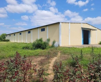 A venda TERRENO EM VIANA, POR DETRÁS DO PORTO SECO, COM UMA NAVE/ARMAZÉM