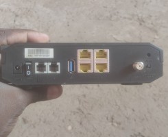 A venda Cisco - modem de cabo + roteador Wi-Fi + telefone VoIP